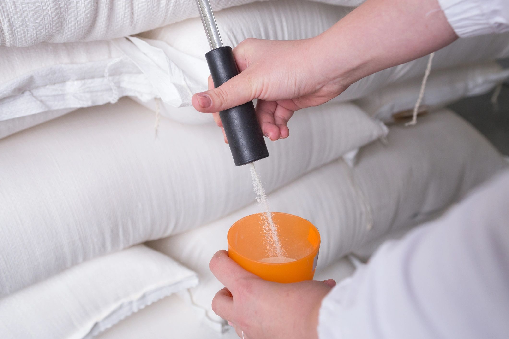 Sampling product from bags for quality inspection